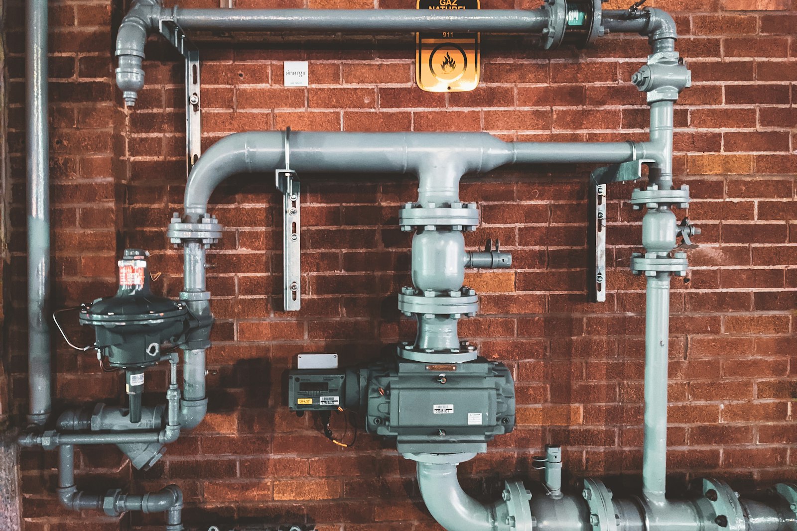 Industrial piping and mechanical systems representing skilled trade work